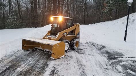 skid steer snow plowing techniques|plow wheels instead of skids.